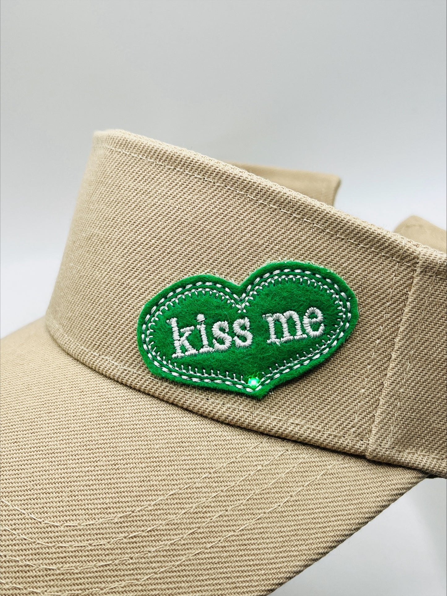 Visor With An Illuminated "Kiss Me" Patch