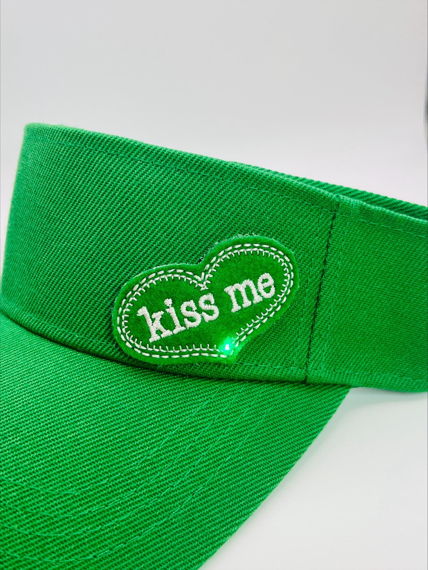 Visor With An Illuminated "Kiss Me" Patch