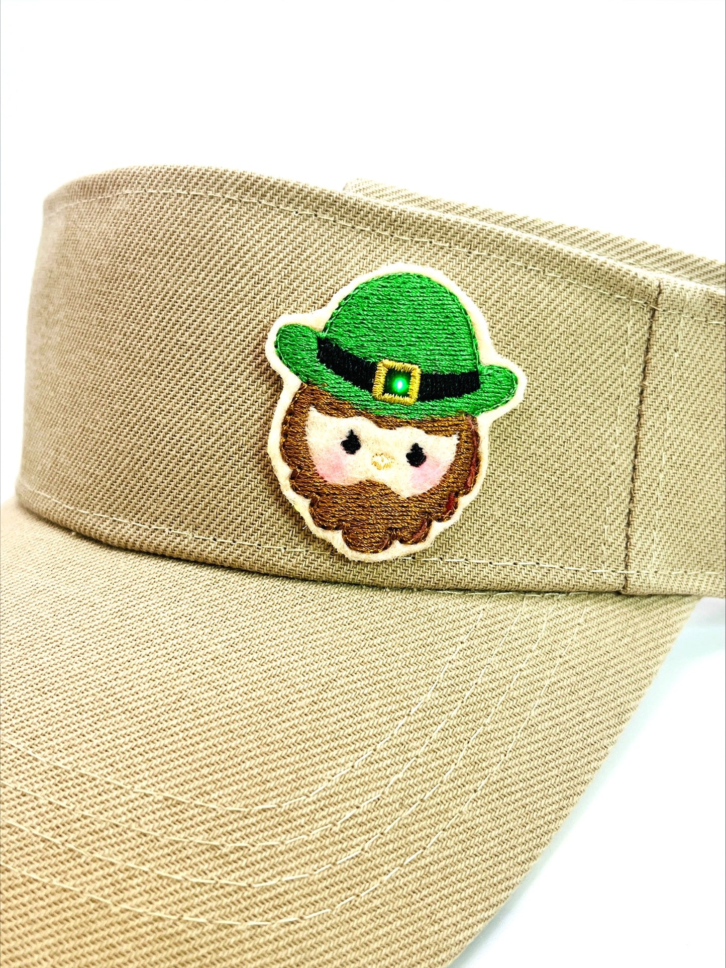 Visor With An Illuminated Buckle On A "Leprechaun" Patch