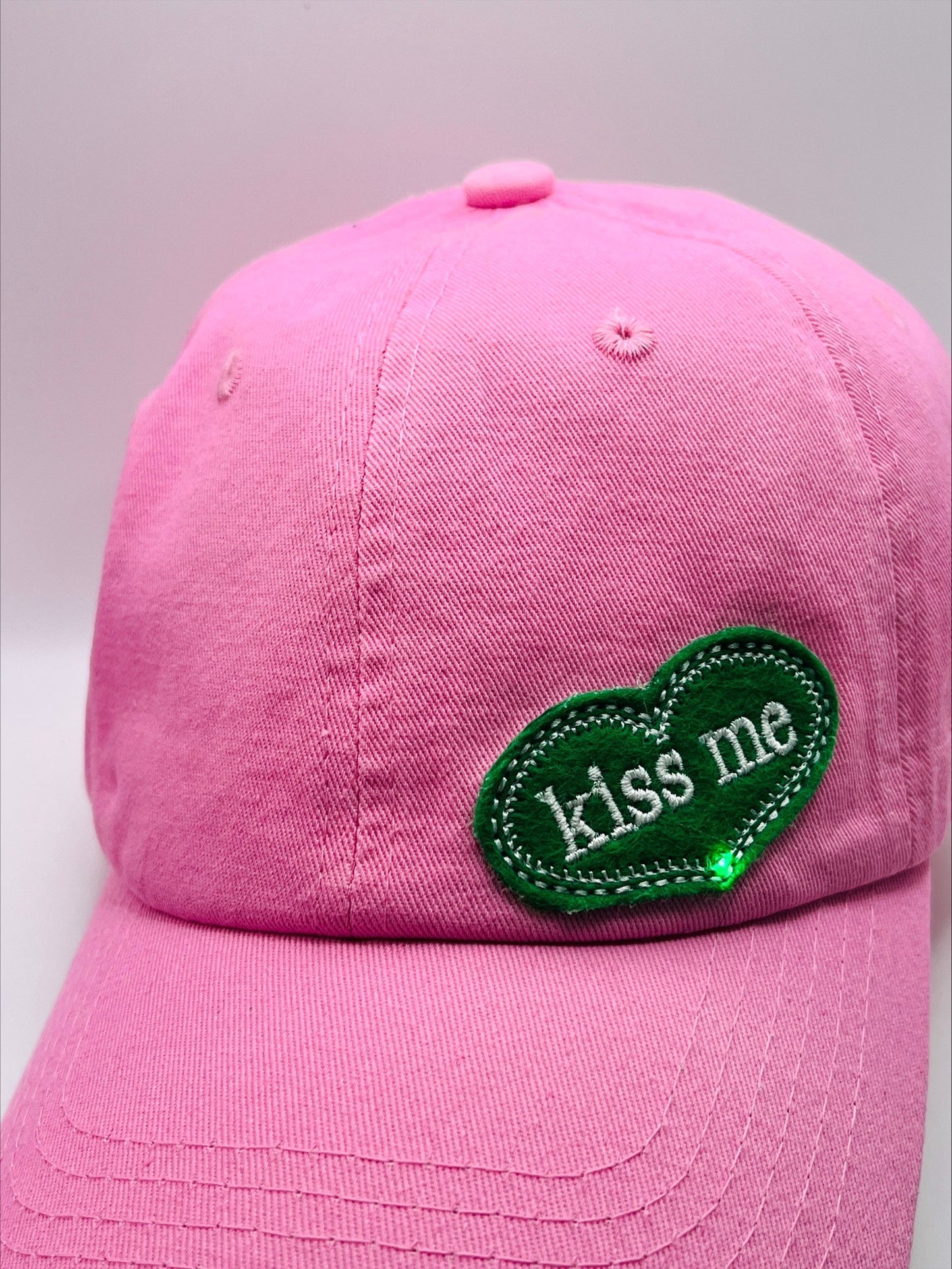 Illuminated "Kiss Me" Patch >>> On A Kelly Green or Pink Baseball Cap