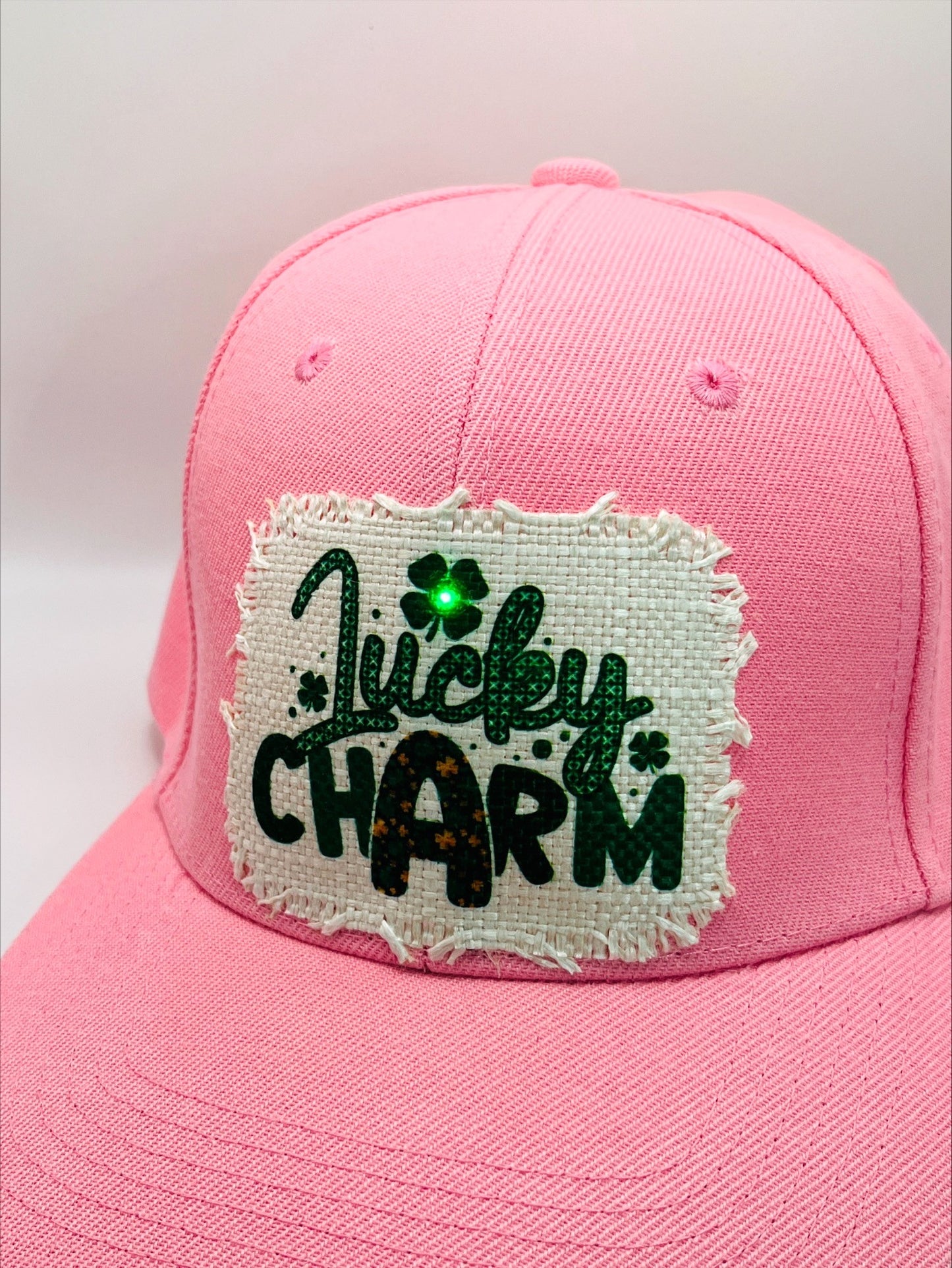 Illuminated Shamrock In A "Luck Charm" Patch >>> On A Kelly Green or Pink Baseball Cap